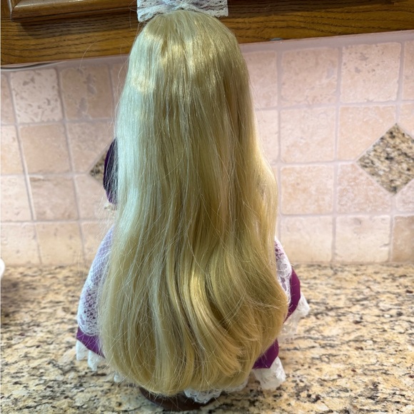 Vintage 16” Porcelain Doll with purple dress and blonde hair, blue eyes. - Picture 3 of 6